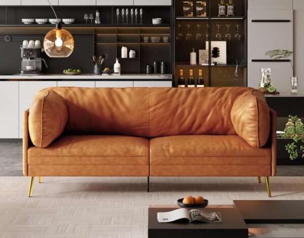 Stylish living room displaying a Vesgantti 73-inch orange leather couch and a coffee table, perfect for cozy gatherings.